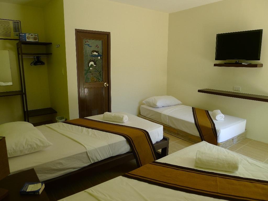 بويرتو برينسيسا By The Bay, Jacana Bed & Breakfast الغرفة الصورة