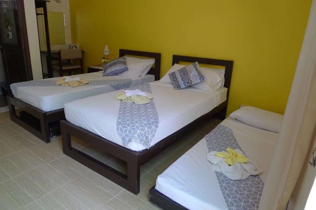 بويرتو برينسيسا By The Bay, Jacana Bed & Breakfast الغرفة الصورة
